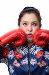 Squint Eyed Crazy Woman In Boxing Gloves Stock Photo