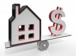 House And Dollar Balancing Showing Investment Stock Photo