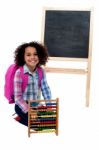 Happy School Girl With Abacus And Pink Backpack Stock Photo