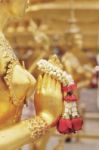 Close-up Hand Of Golden Statue Of Kinara Sawasdee At Wat Phra Kaew In Bangkok, Thailand Stock Photo
