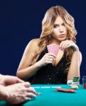 Woman Doubt In Gambling Match Stock Photo