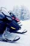 Two Snowmobiles In The Mountains Stock Photo