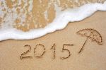 Inscription Of The Year 2015 Written In The Wet Yellow Beach Sa Stock Photo