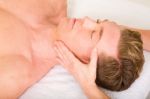 Man Receiving Face Massage Stock Photo