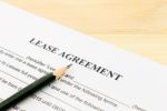 Lease Agreement Contract Document And Pencil Bottom Left Corner Stock Photo