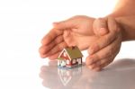 Hands And Little House Stock Photo