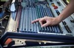 Sound Engineer Works With Sound Mixer Stock Photo