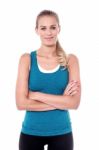 Sporty Woman With Folded Arms Stock Photo