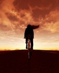 Girl Riding Bicycle In Street Outdoors At Sunrise Or Sunset Stock Photo