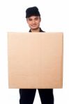 Young Boy Delivering Parcel Stock Photo