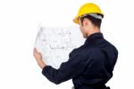 Civil Engineer Reviewing Blueprint Stock Photo