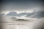Coast Of  Norway Sea In Clouds Of Fog. Cloudy Nordic Day Stock Photo