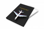 Airplane And Passport Stock Photo