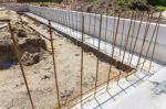 Building Site With Iron Bars In Concrete Foundation Stock Photo