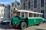 Old Bus In Market Square Bruges Stock Photo