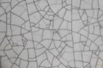 Surface Cracked Tile Pattern For A Backdrop Stock Photo
