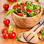 Mixed Lettuce Salad And Tomatoes Stock Photo