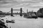 View Of Tower Bridge And The Pool Of London With Two Warships Stock Photo