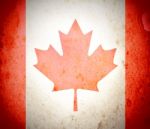 Canadian Flag On Grunge Paper  Stock Photo