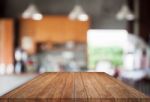 Brown Top Wooden With Abstract Blur Coffee Shop Background Stock Photo
