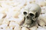Still Life Of Human Skull With Candy Stock Photo