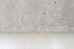 Top Of Wood Table On Old Concrete Wall Background Stock Photo