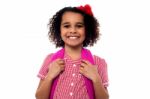 Smiling School Girl With A Backpack Stock Photo