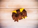 Gift Box On The Wooden Board Stock Photo