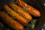 Sausages & Rosemary Stock Photo