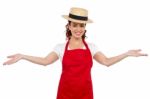 Female Chef Showing Welcome Gesture Stock Photo