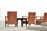 3 Chairs By The Sea Stock Photo