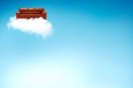 Red Sofa On Cloud With Sky Stock Photo