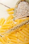 Italian Pasta Penne With Wheat Stock Photo