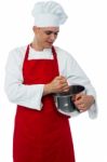 Male Chef With Whisk And Mixing Bowl Stock Photo