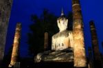 Ancient Buddha Statue At Twilight, Wat Mahathat In Sukhothai His Stock Photo