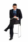 Businessman With Notebooks Stock Photo
