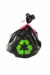 Black Plastic Garbage Bag And Recycle Sign On White Background Stock Photo