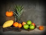 Still Life Pumpkin,pineapple And Fruits Stock Photo