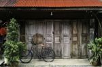 Vintage Retro Wood Door House With Bicycle Stock Photo