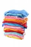 Pile Of Multiple Color Cloths On White Background Stock Photo
