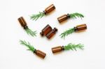 Glass Bottle Of Essential Oil  With Rosemary Stock Photo
