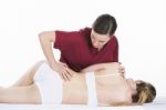 Physical Therapist Which Makes Spinal Mobilization Stock Photo