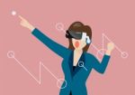 Woman Using Virtual Reality Headset Stock Photo
