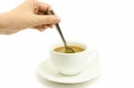 Stirring Coffee With Spoon Stock Photo