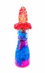 Beautiful Flowers In Glass Bottle With Hydrogel Isolated On Whit Stock Photo