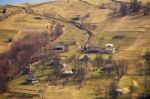 Sunny Spring In Mountain Village. Fields And Hills Stock Photo