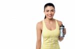 Fit Woman Holding Sipper Bottle Stock Photo