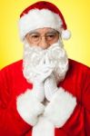 Santa Trying To Recollect His Old Memories Stock Photo