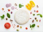 The Ingredients For Homemade Pizza On White Wooden Background Stock Photo