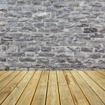 Wooden Deck Floor And Brick Wall Stock Photo